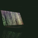 turned on laptop on table