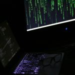 A laptop computer sitting on top of a desk