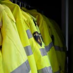 yellow and green striped polo shirt