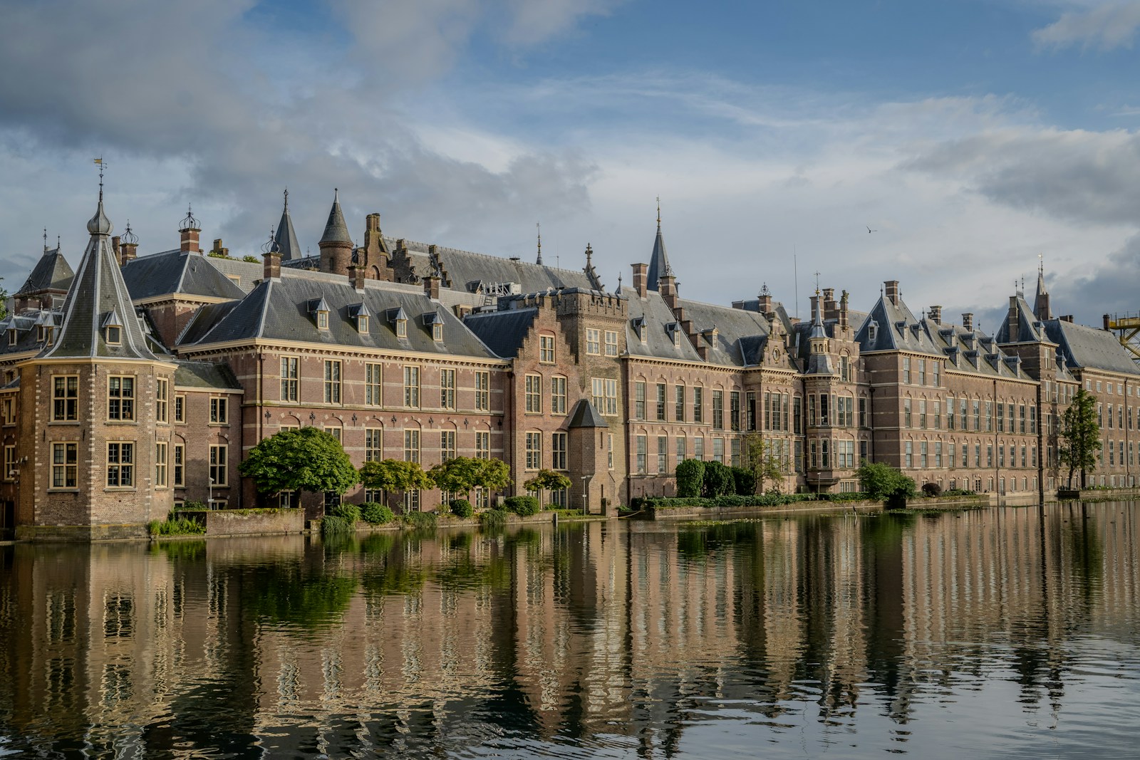 A large building sitting next to a body of water