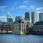 a body of water with buildings along it