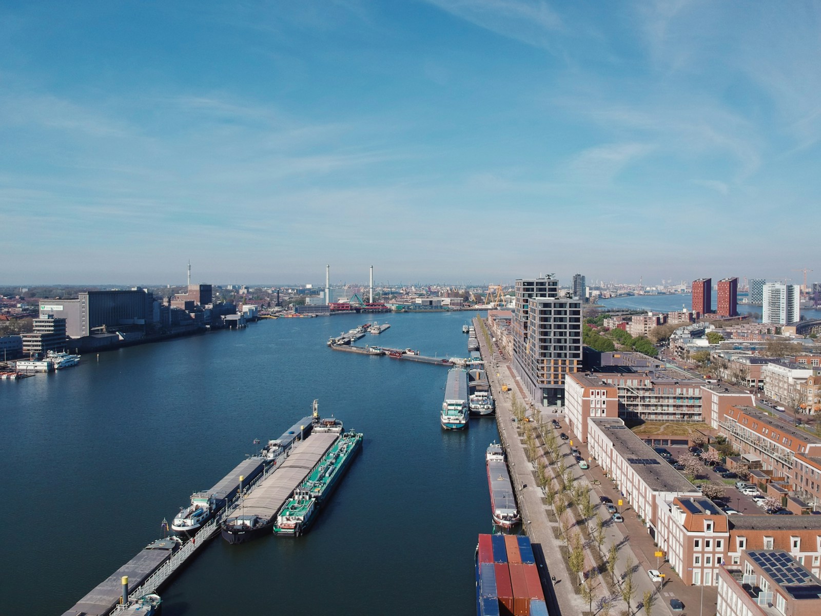 a large body of water surrounded by tall buildings